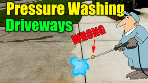 pressure washing concrete driveway