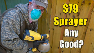 staining wood fence with sprayer